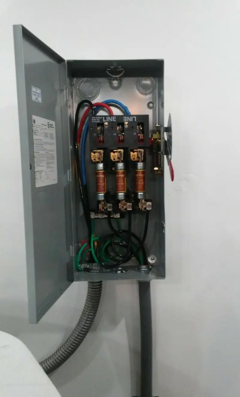 Three-phase disconnect switch installed for Electrical Wiring & Rewiring in Combee Settlement
